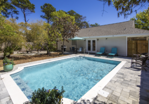 Beach Hideaway - pool and exterior of rental house