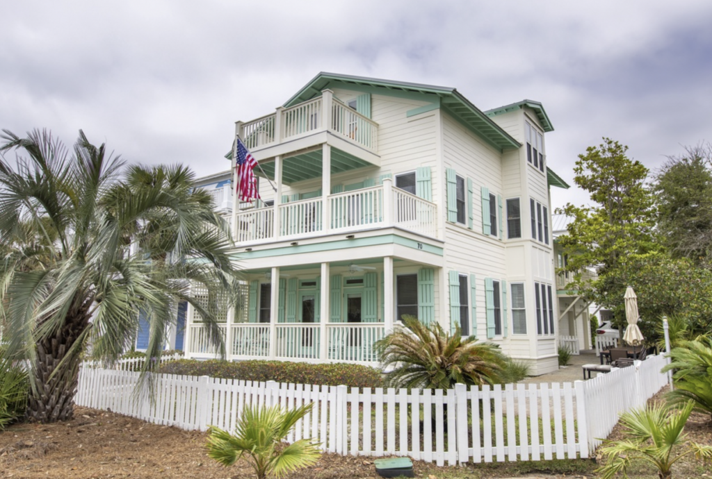 Exterior of the Tide Life + Carriage House vacation rental in Gulf Place, FL